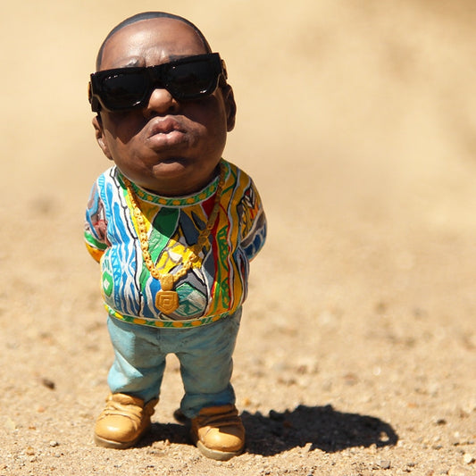 Tiny tributes to hip-hop history. Our miniature figure of The Notorious B.I.G. honors the pioneers of old-school rap. These sleek, iconic designs capture the essence of an era. Perfect for any music lover's display.